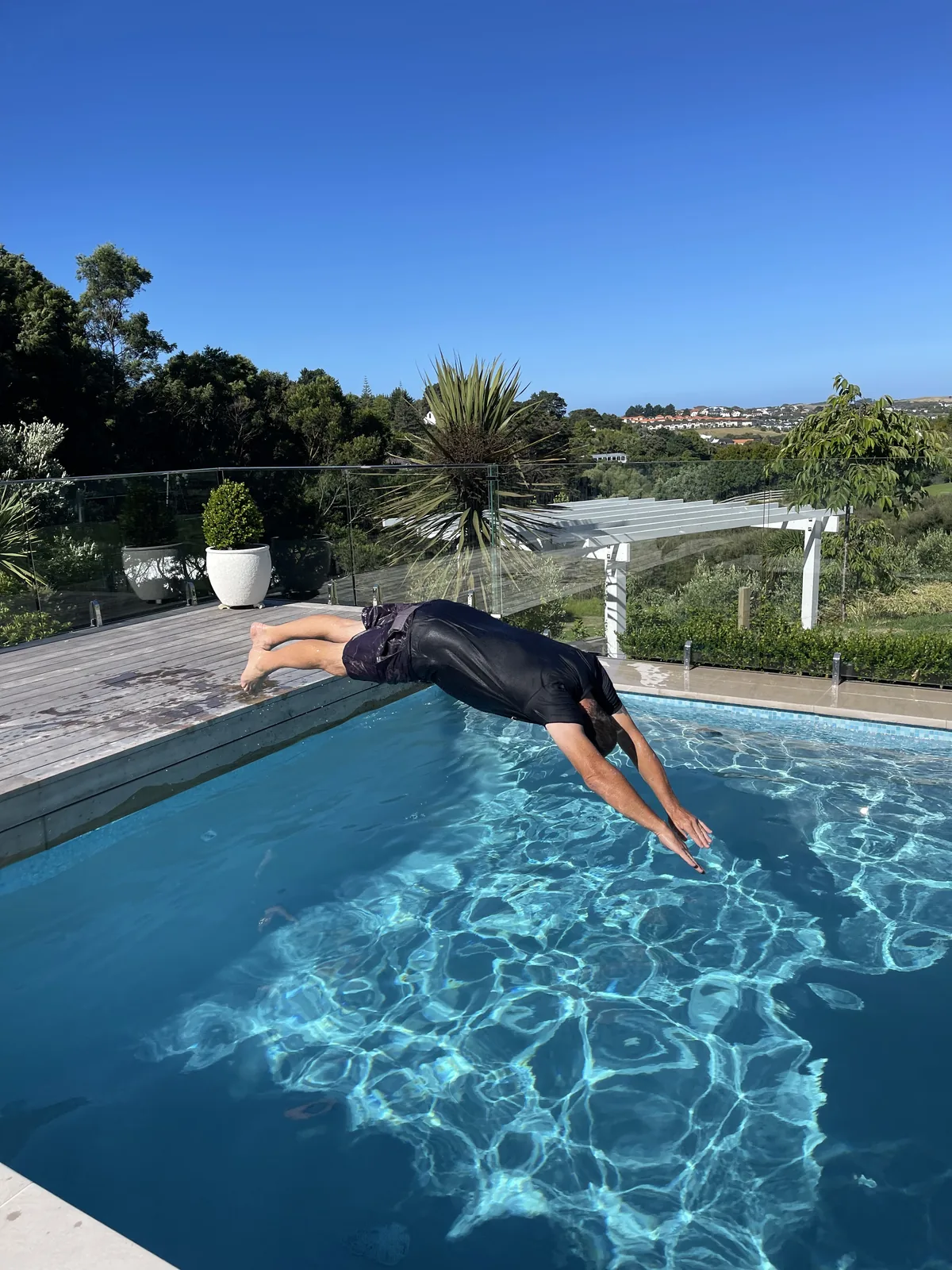 Diving into a heated pool
